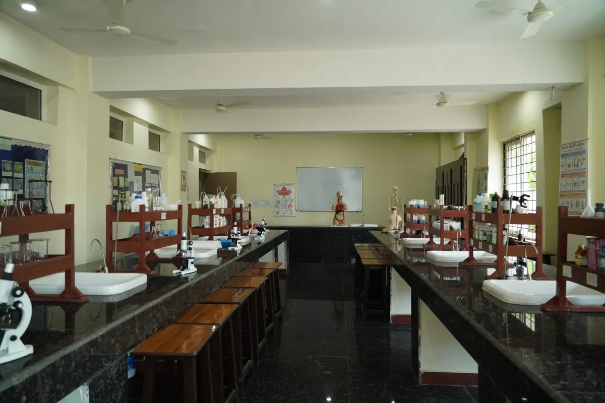 Science laboratory with granite workbenches, sinks, microscopes and anatomy models