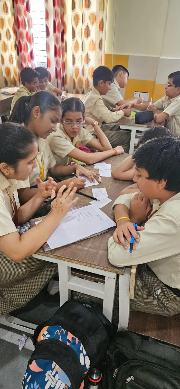 Students working together on a group activity in class at SKS World School, Greater Noida West