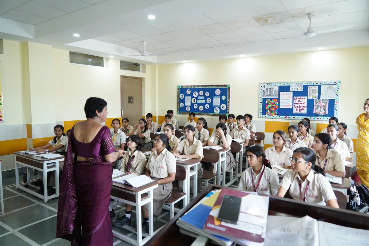 Teacher taking a lesson with senior students, SKS World School, Greater Noida West