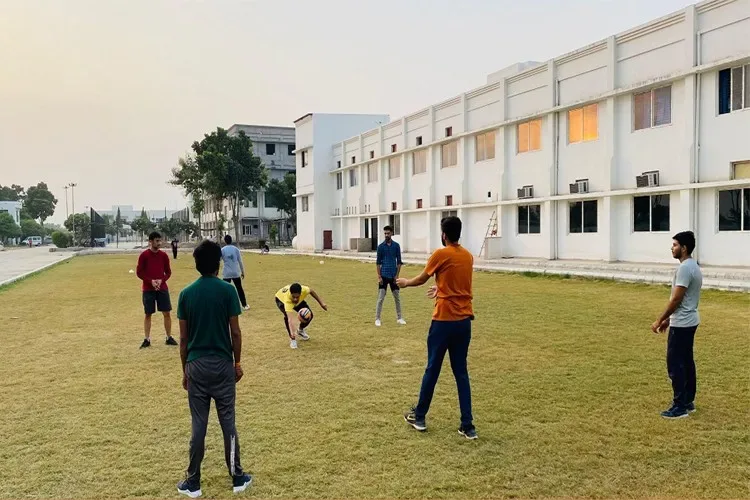 Students playing volleyball on campus