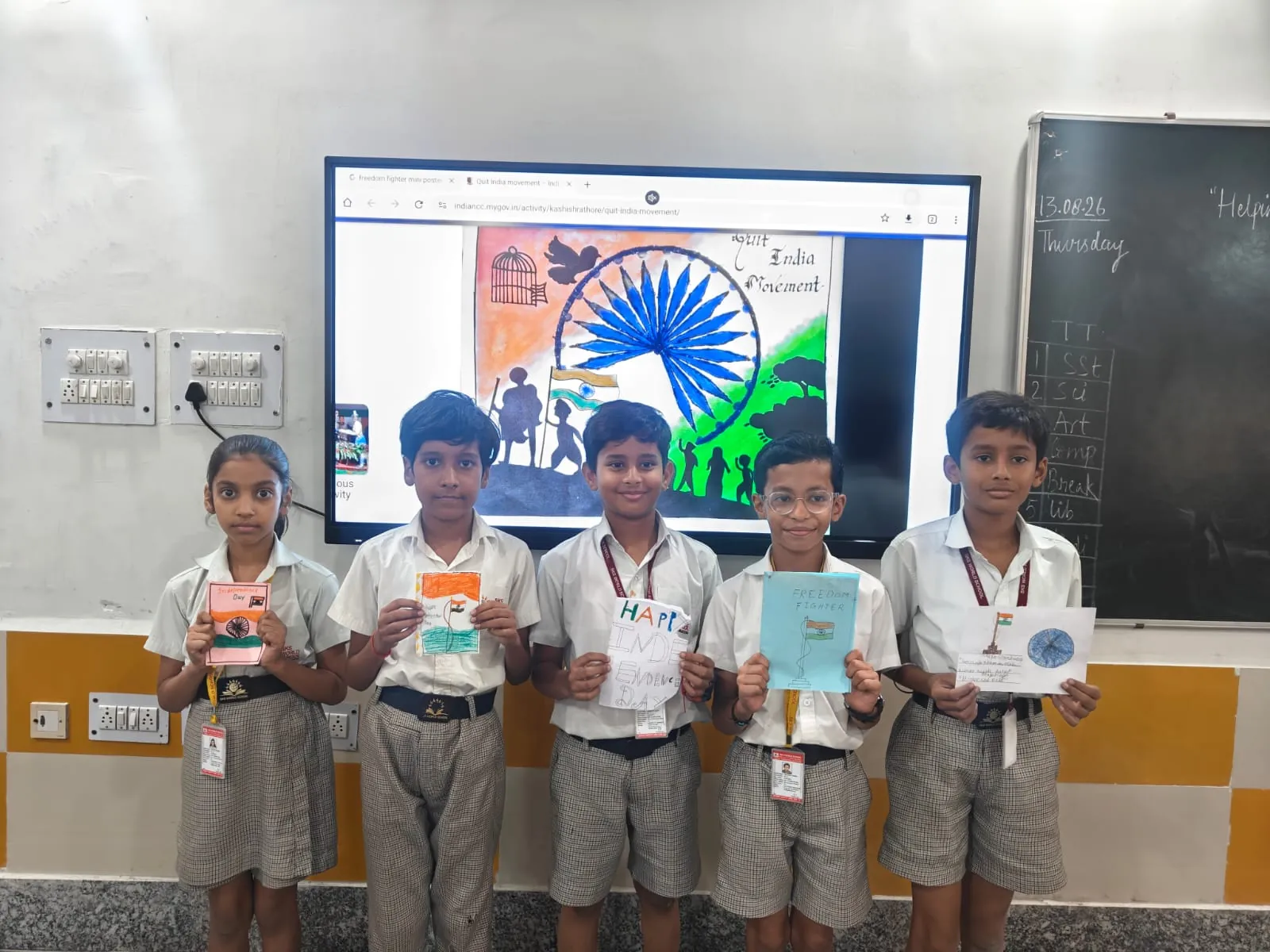 Students holding their handmade Independence Day cards at SKS World School, Greater Noida West