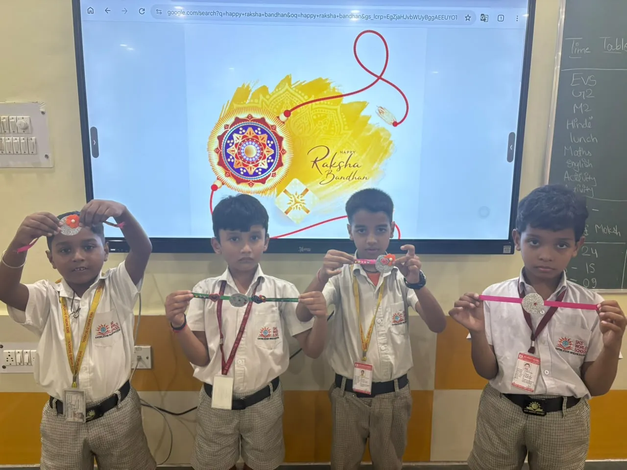 Students holding the rakhis they made for Raksha Bandhan at SKS World School, Greater Noida West