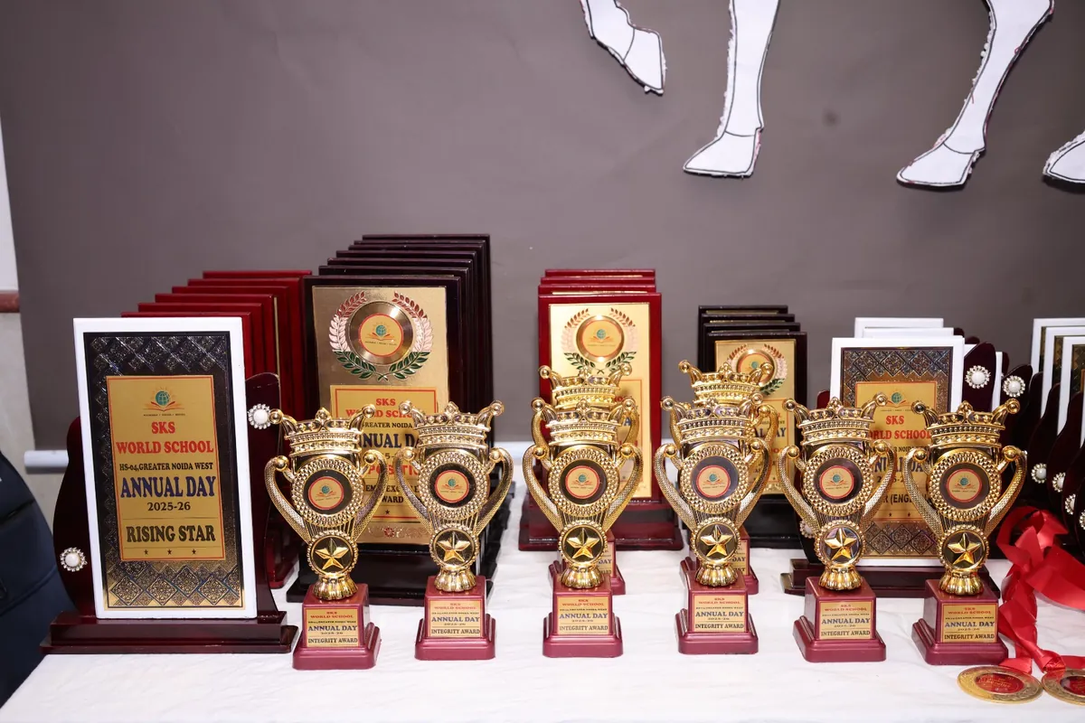 Annual Day trophies and Rising Star award plaques at SKS World School, Greater Noida West