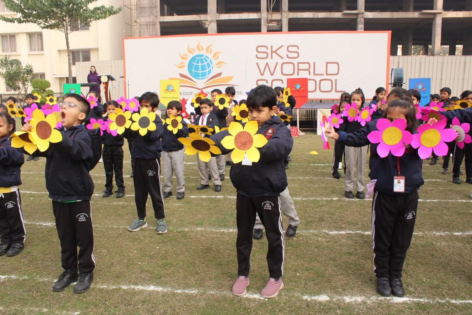 Pre-primary children of SKS World School, Greater Noida West performing a flower drill on Sports Day