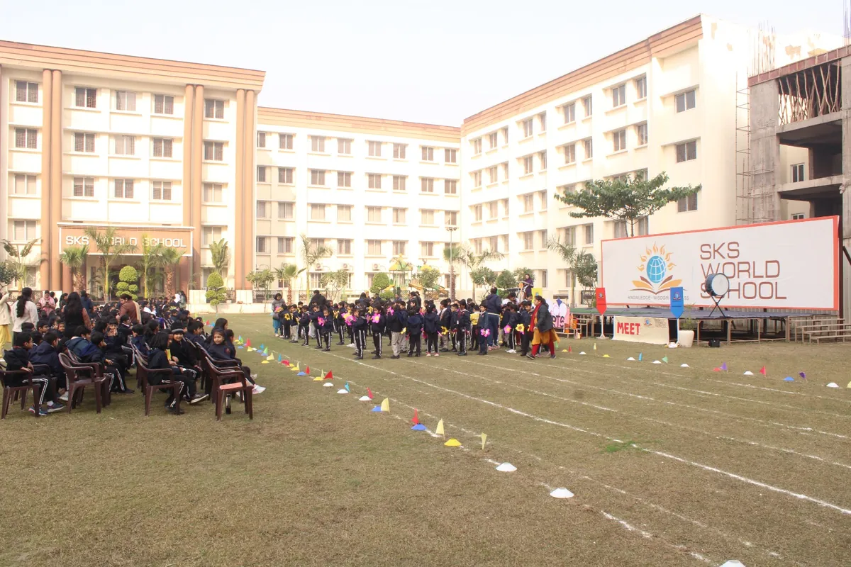 Sports Day on the SKS World School ground with the school building behind at SKS World School, Greater Noida West