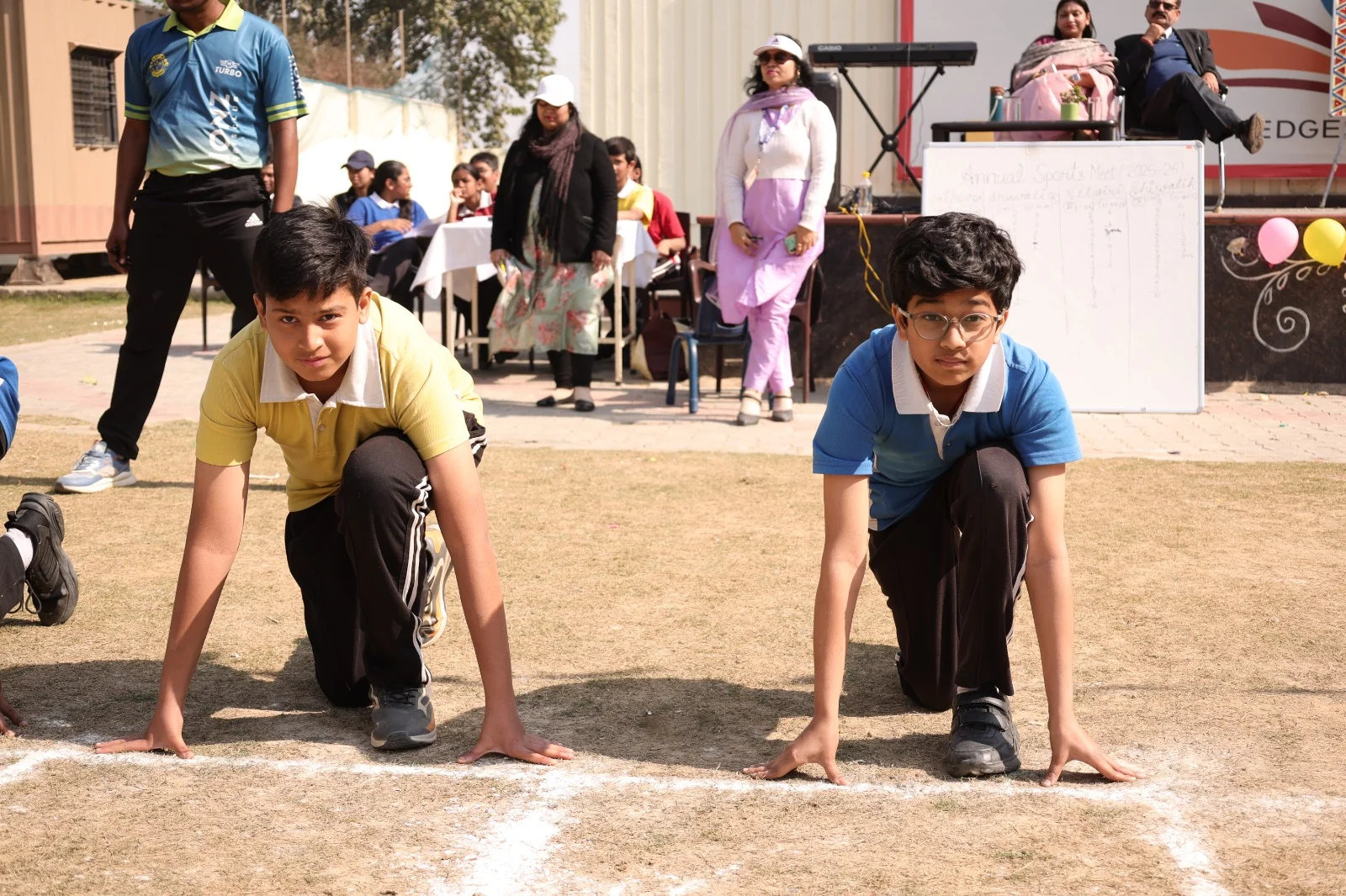 Senior students of SKS World School, Greater Noida West at the start line of a Sports Day race