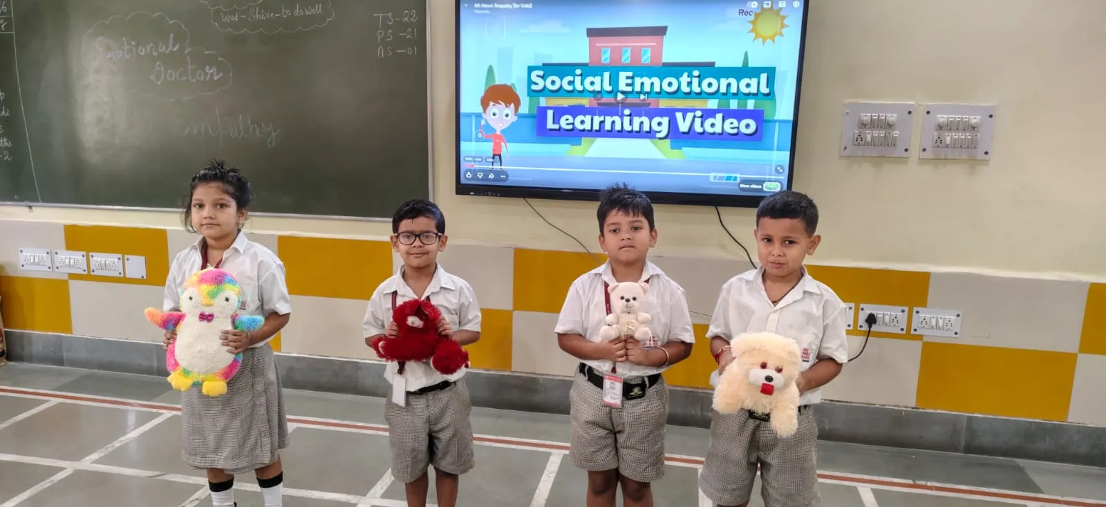 Kindergarten students with soft toys during a social-emotional learning lesson at SKS World School, Greater Noida West