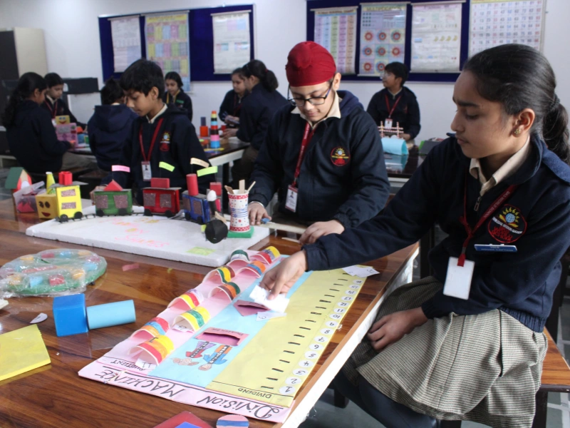 Students presenting working models at a student exhibition at SKS World School, Greater Noida West